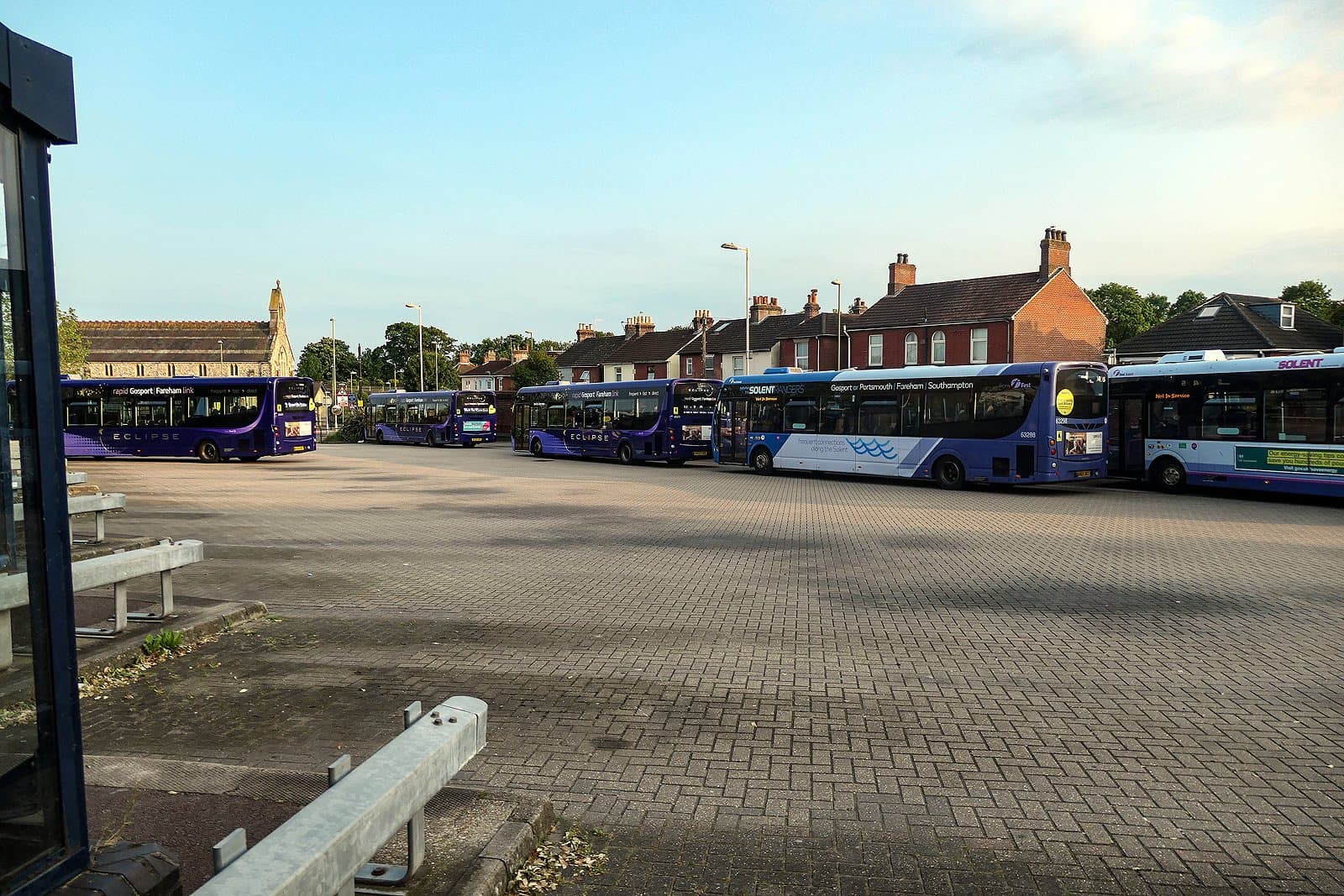 Eclipse and other buses parked at Fareham bus station in evening sun, Fareham, Hampshire